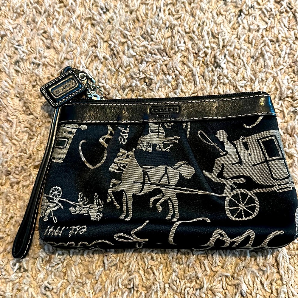Good used condition black Coach single zip small wristlet